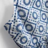 Camiseta sin mangas de algodón con calados