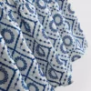 Camiseta sin mangas de algodón con calados