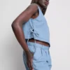 Camiseta sin mangas de denim de algodón con lazos laterales