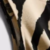 Camiseta sin mangas estampada de corte largo