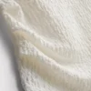Camiseta sin mangas fruncida y arrugada de Paula Echevarría