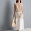 Camiseta sin mangas larga de encaje transparente