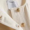 Chaleco corto de algodón con bolsillo delantero