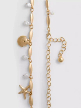 Cinturón con cadena y colgante de concha