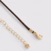 Collar con cordón y colgante con inicial