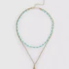 Collar de peces con cuentas en capas