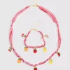 Conjunto de joyas con colgantes de frutas