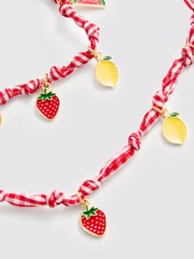 Conjunto de joyas con colgantes de frutas