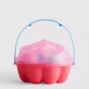 Conjunto de juego con moldes de arena para hacer helados en la playa