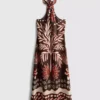 El vestido midi con cuello halter estampado de mezcla de lino de The Edit