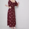 El vestido midi de lino con mangas abullonadas de The Edit