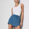 Falda-pantalón asimétrica cruzada de denim de algodón