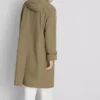 Impermeable largo con capucha ajustada