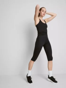 Leggings capri deportivos de cintura alta, lisos y con sujeción