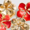 Lote de 2 pares de pendientes de botón con motivos florales