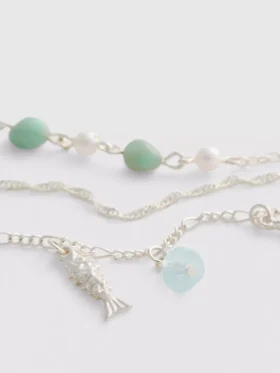 Lote de 3 collares con dijes variados