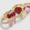 Lote de 5 anillos con dijes