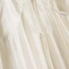 Minivestido con volantes y ribete de encaje de Paula Echevarría