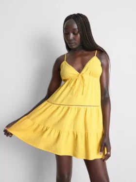 Minivestido de algodón con cuello en V y volantes