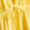 Minivestido de algodón con cuello en V y volantes