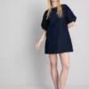 Minivestido de denim de algodón con mangas abullonadas