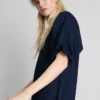 Minivestido de denim de algodón con mangas abullonadas
