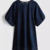 Minivestido de denim de algodón con mangas abullonadas