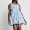 Minivestido de popelín con volantes y tirantes