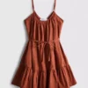 Minivestido de popelín con volantes y tirantes