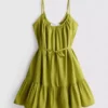 Minivestido de popelín con volantes y tirantes