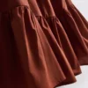 Minivestido de popelín con volantes y tirantes