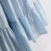 Minivestido de popelín con volantes y tirantes