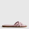 Mules con tiras entrelazadas