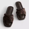 Mules con tiras entrelazadas