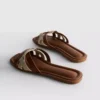 Mules con tiras entrelazadas