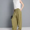 Pantalones acampanados plisados con tacto de papel