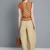 Pantalones acampanados plisados con tacto de papel