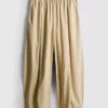 Pantalones acampanados plisados con tacto de papel