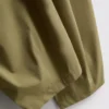 Pantalones acampanados plisados con tacto de papel