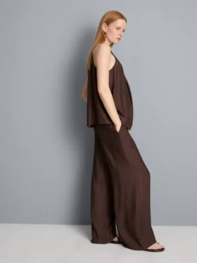 Pantalones anchos con textura y cordón