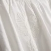 Pantalones anchos de algodón bordados