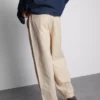 Pantalones chinos holgados de talle medio