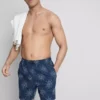 Pantalones Cortos con estampado de sol bordado