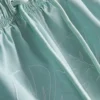 Pantalones Cortos con hojas bordadas