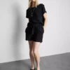 Pantalones cortos sin cremallera con cinturón