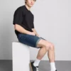 Pantalones cortos vaqueros ajustados de talle medio