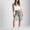 Pantalones Cortos vaqueros con dobladillo sin rematar