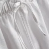 Pantalones Cortos vaqueros con volantes en el bajo
