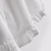 Pantalones Cortos vaqueros con volantes en el bajo