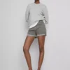 Pantalones Cortos vaqueros de talle medio con vuelta